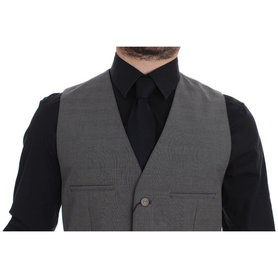 Dolce & Gabbana gray cotton slim fit dress vest worn over a black shirt and tie, showcasing its sleek design.