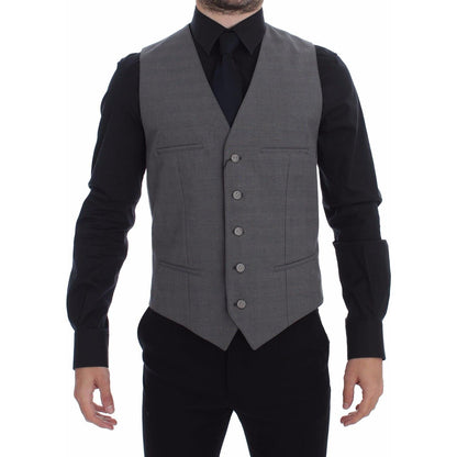 Dolce & Gabbana gray cotton slim fit dress vest displayed on model with black shirt, full button front and four pockets.