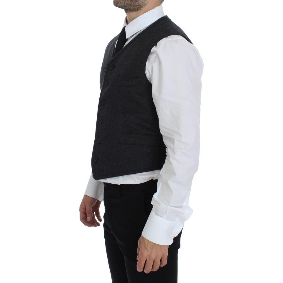 Dolce & Gabbana gray wool blend vest worn by a model, showcasing the side view with a formal shirt and tie.