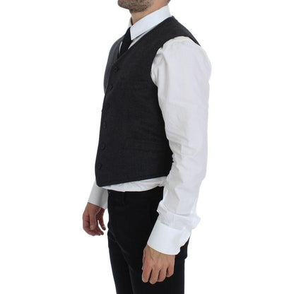 Dolce & Gabbana gray wool blend vest worn by a model, showcasing the side view with a formal shirt and tie.