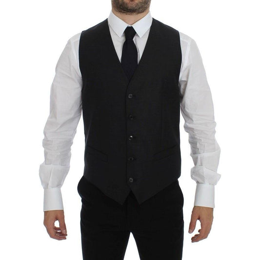 Dolce & Gabbana gray wool silk dress vest on a model, featuring a single-breasted design and adjustable back strap.
